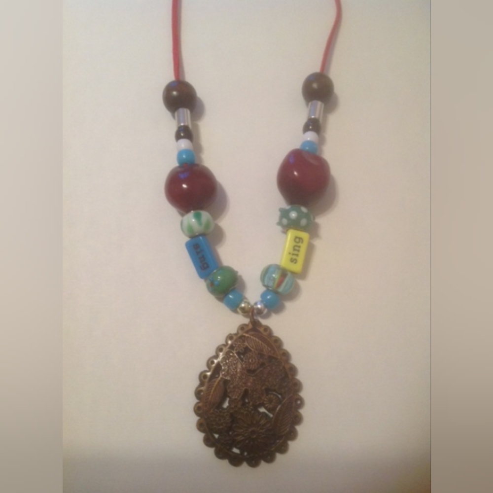 Sing a Song Spring Pendant Necklace